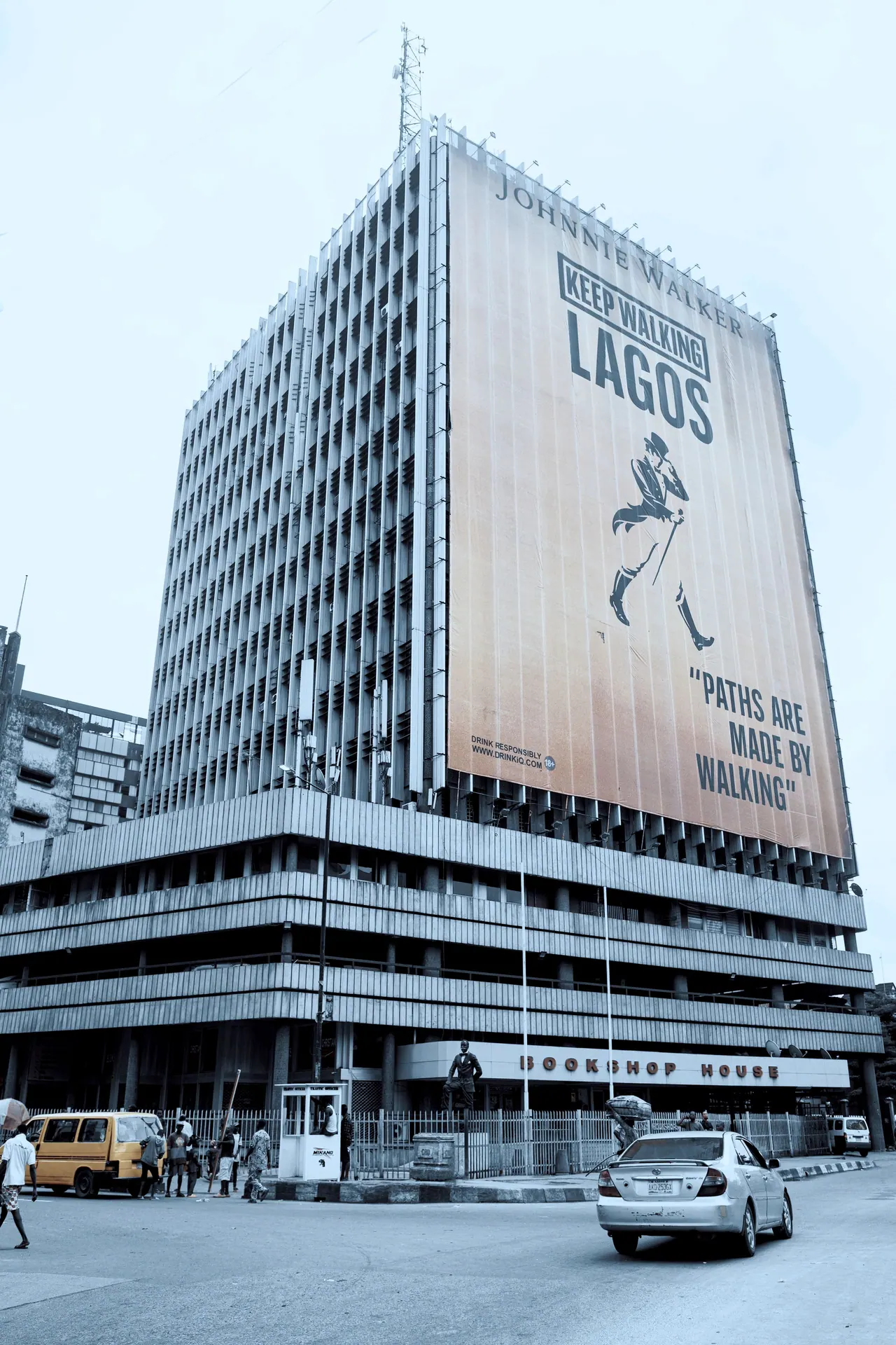 A tall office building in Lagos against a clear sky